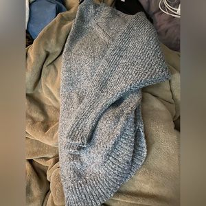 Rounded loose sweater